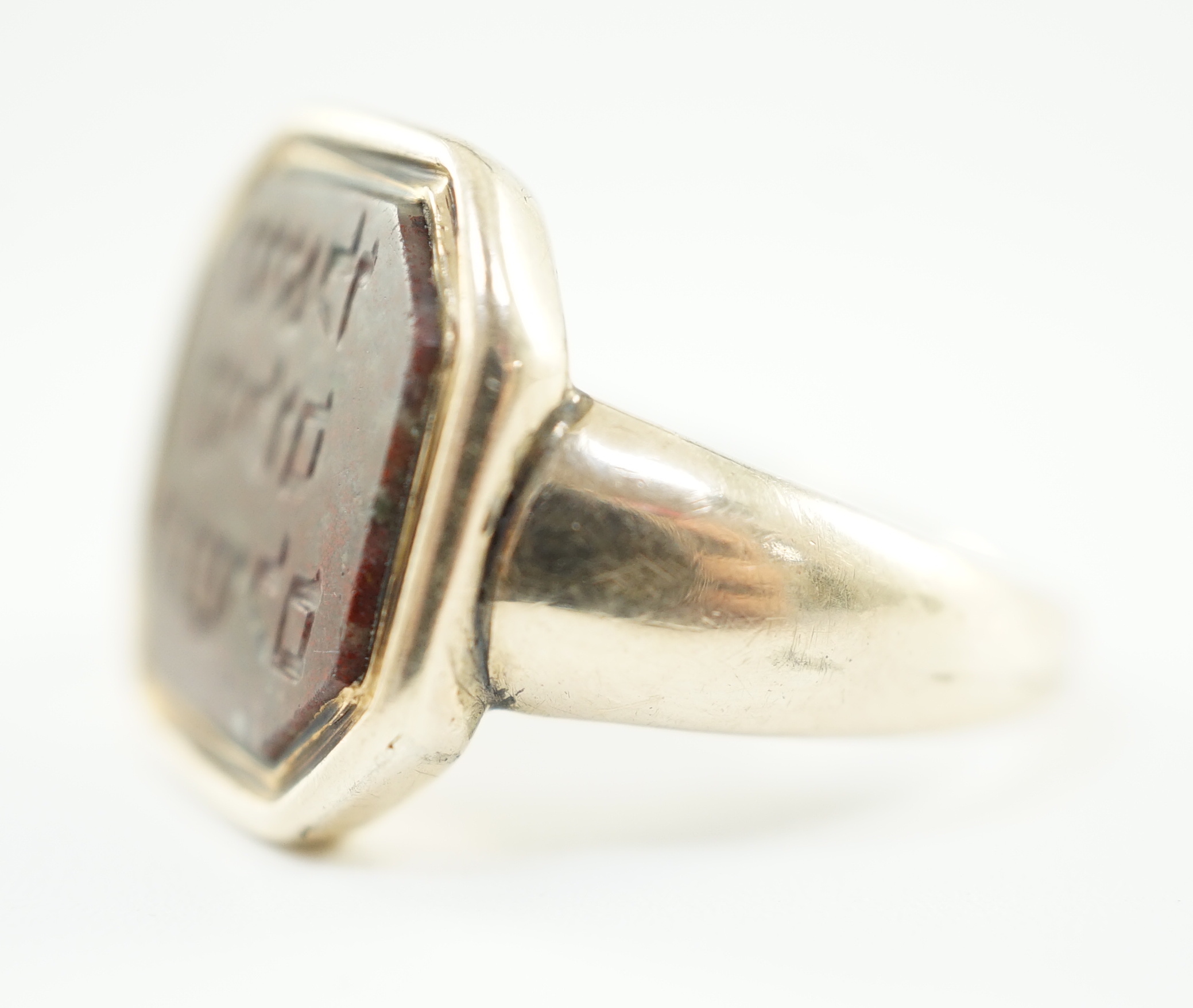 Judaica: A 19th century gold and jasper set ring, the stone carved with Hebrew script